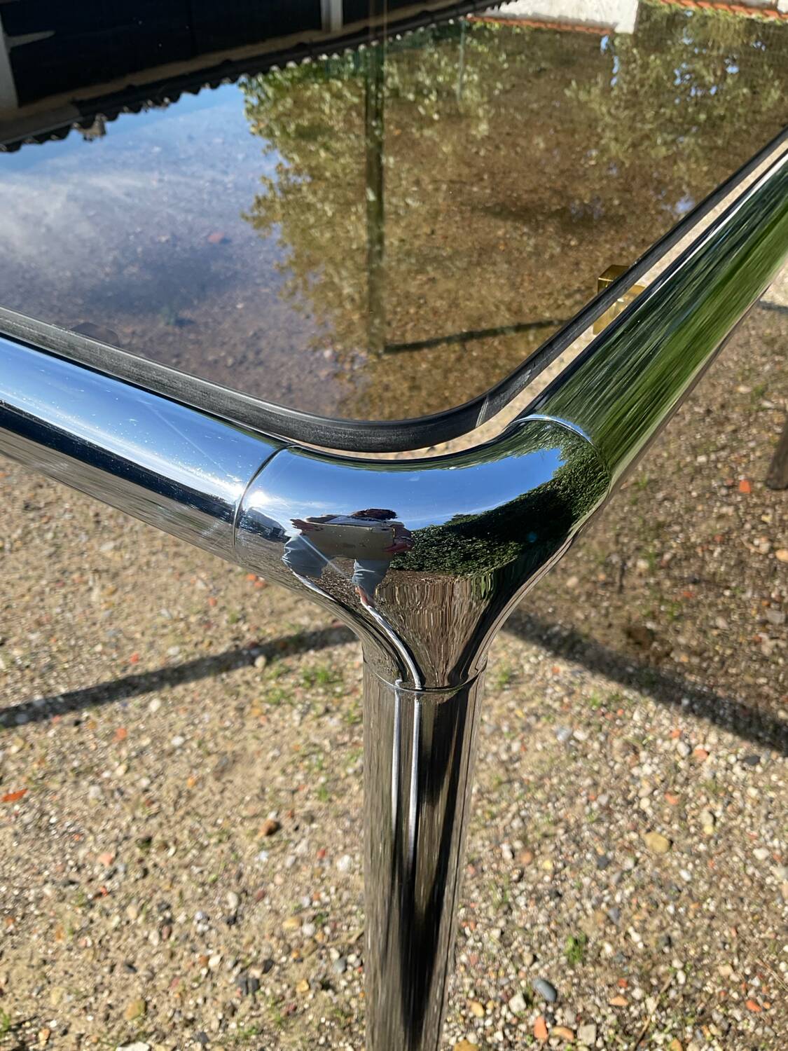 70s dining table in tubular chrome metal and smoked glass