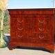 Antique mahogany chest of drawers with white marble.