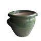 Glazed green terracotta pot.