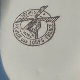 Porcelain gravy boat from the Orchies Moulin des Loups earthenware factory with lilac decoration