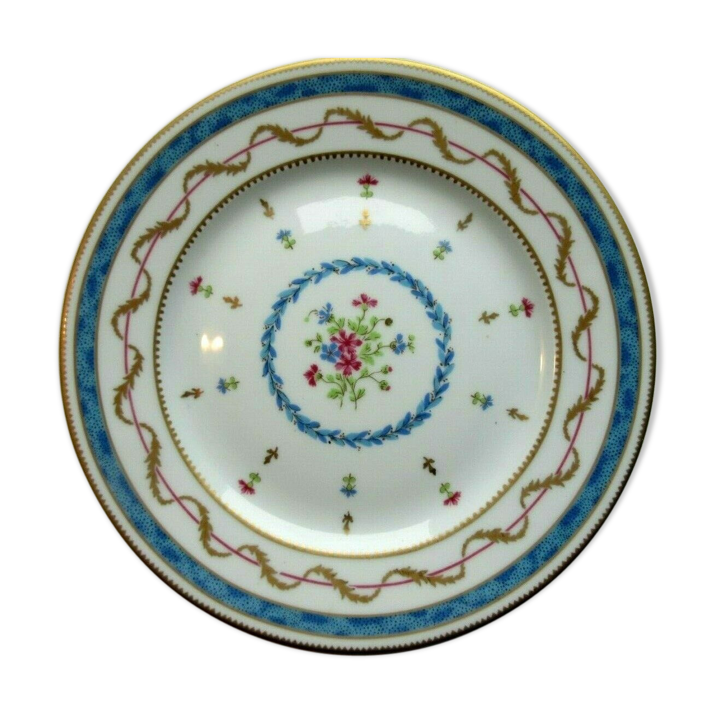 Assiette en porcelaine de Limoges pour Haviland bleue et or