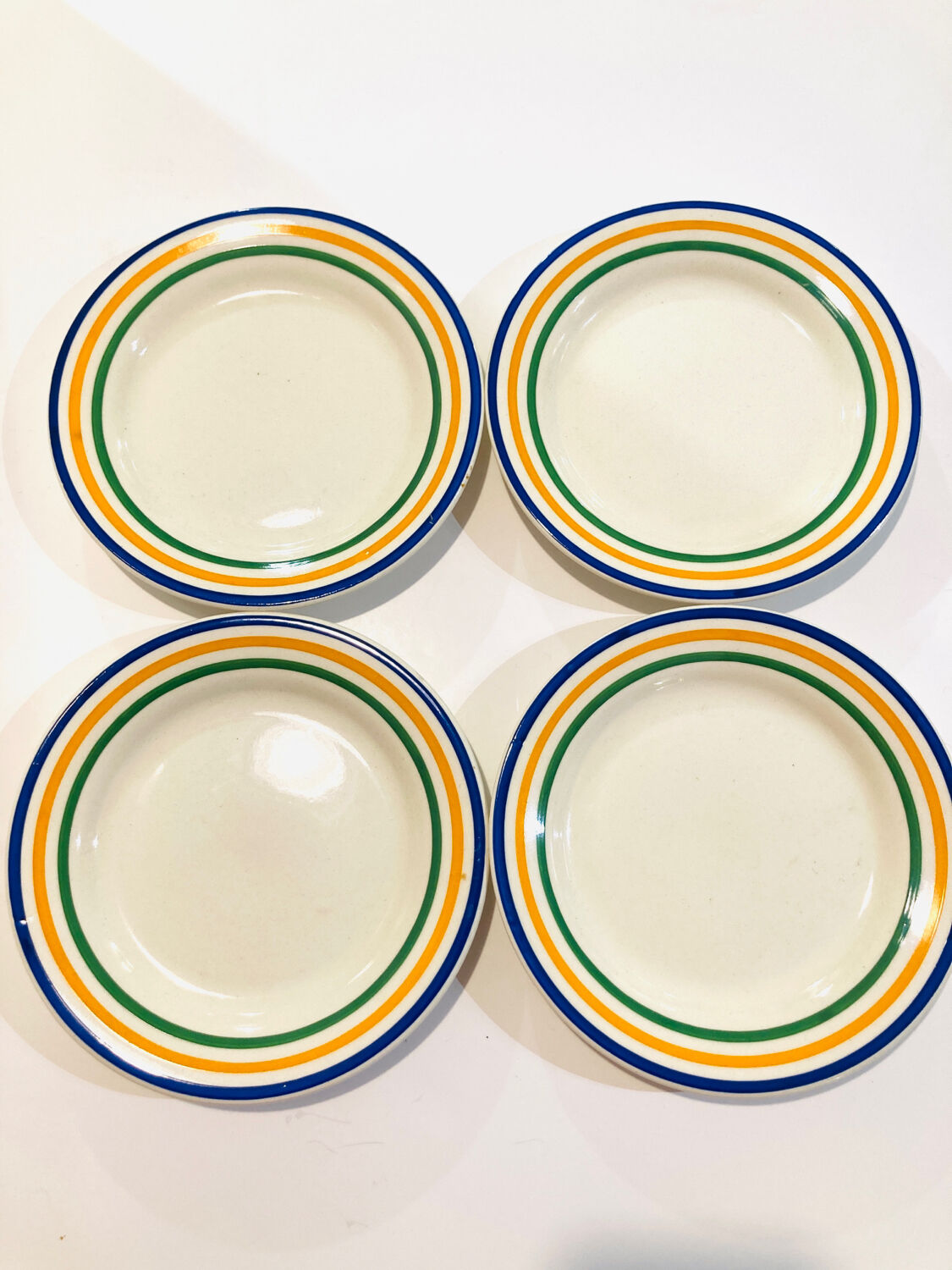 4 striped earthenware plates made in Romania