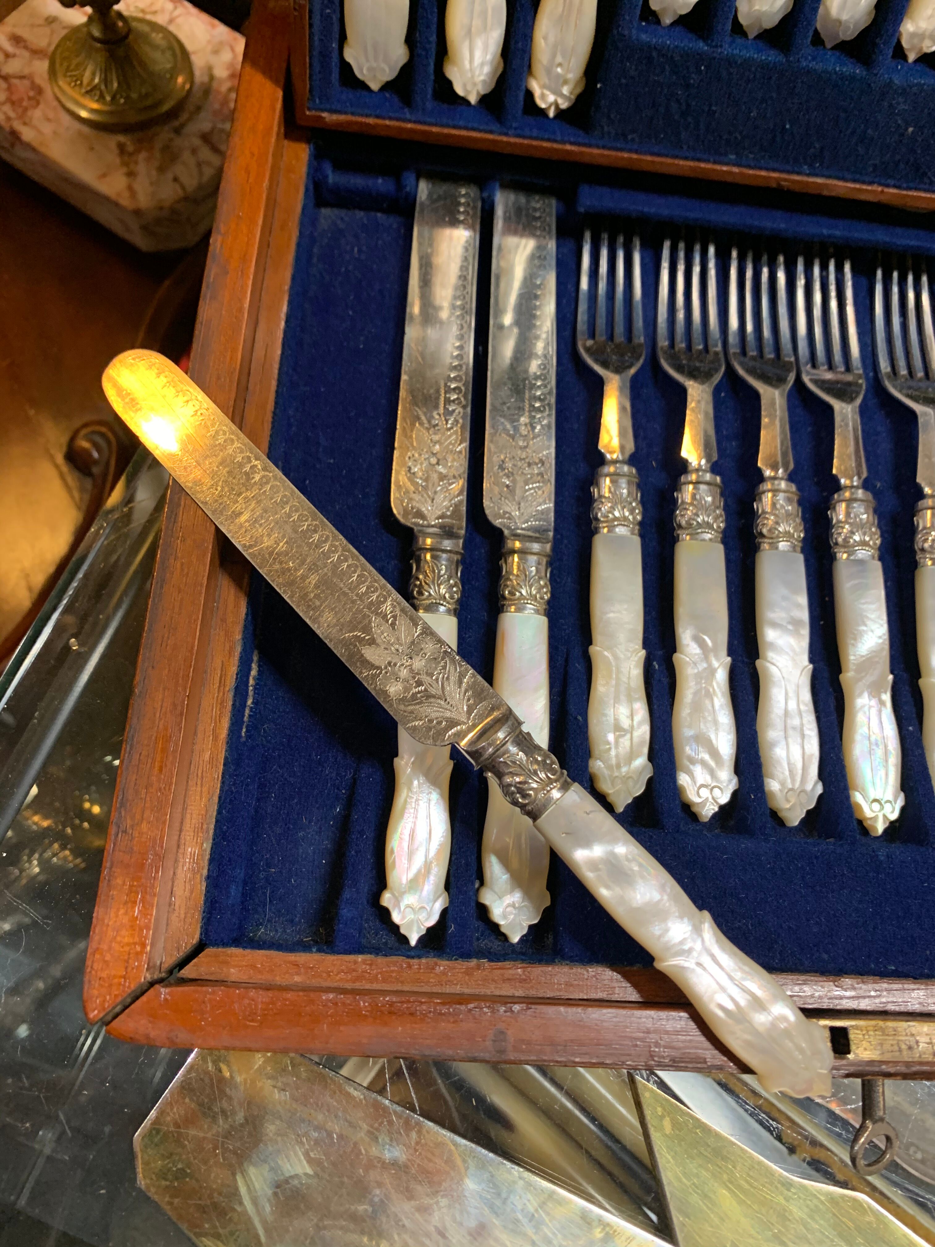 Silver and mother-of-pearl cheese service