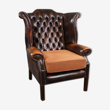 Fauteuil Chesterfield à accoudoirs