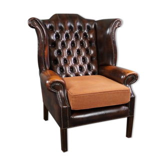 Fauteuil Chesterfield à accoudoirs