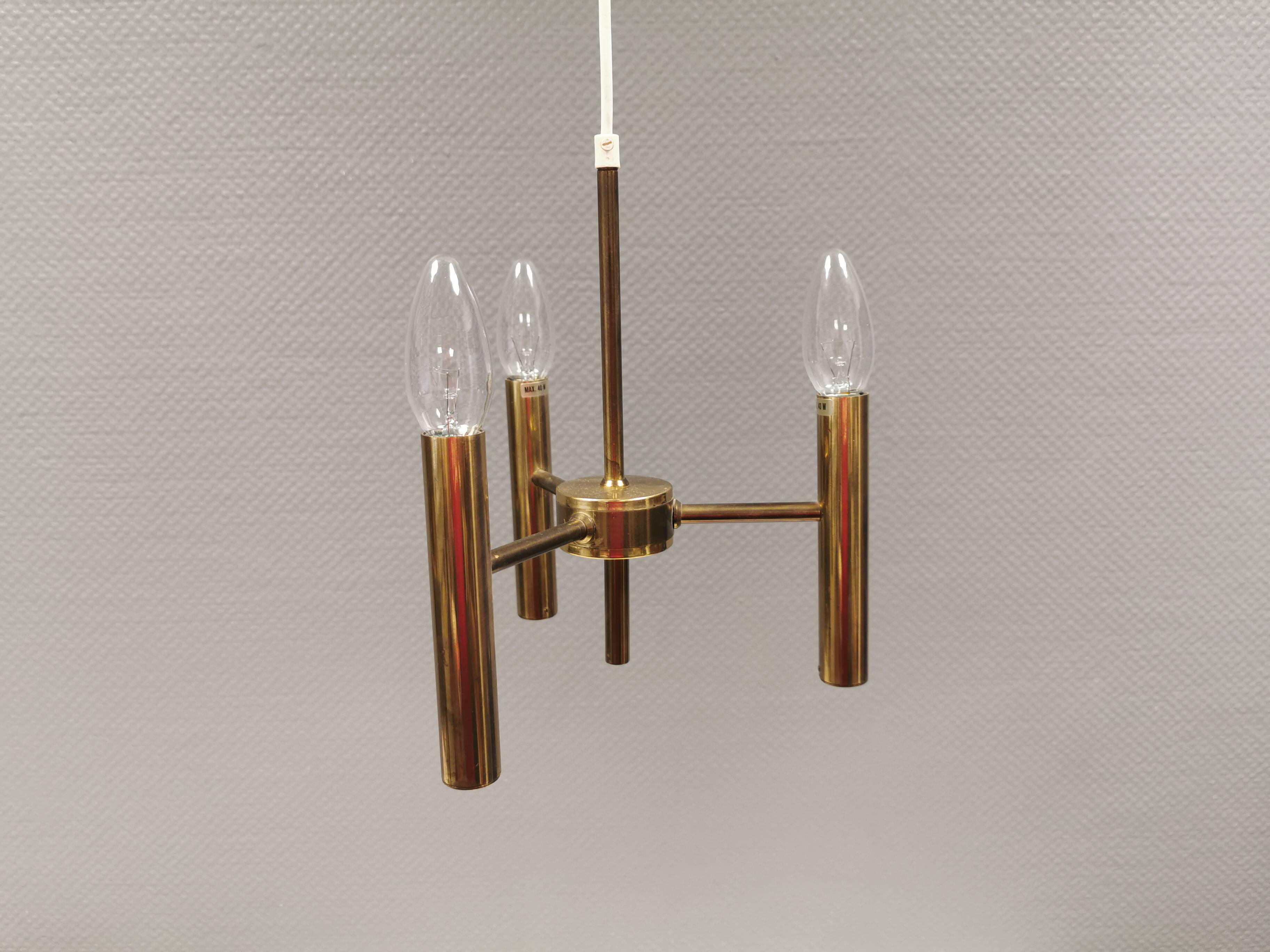 Chandelier with 3 light sources, made of metal and brass. 1960-70s