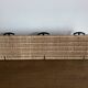 Raoul Guys mid-century iron and wicker wall coat rack