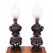 Pair of bronze oil lamps, France, circa 1880.
