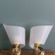 Golden metal appliques and plexiglass perspex in the style of Maison Lunel or Guariche.