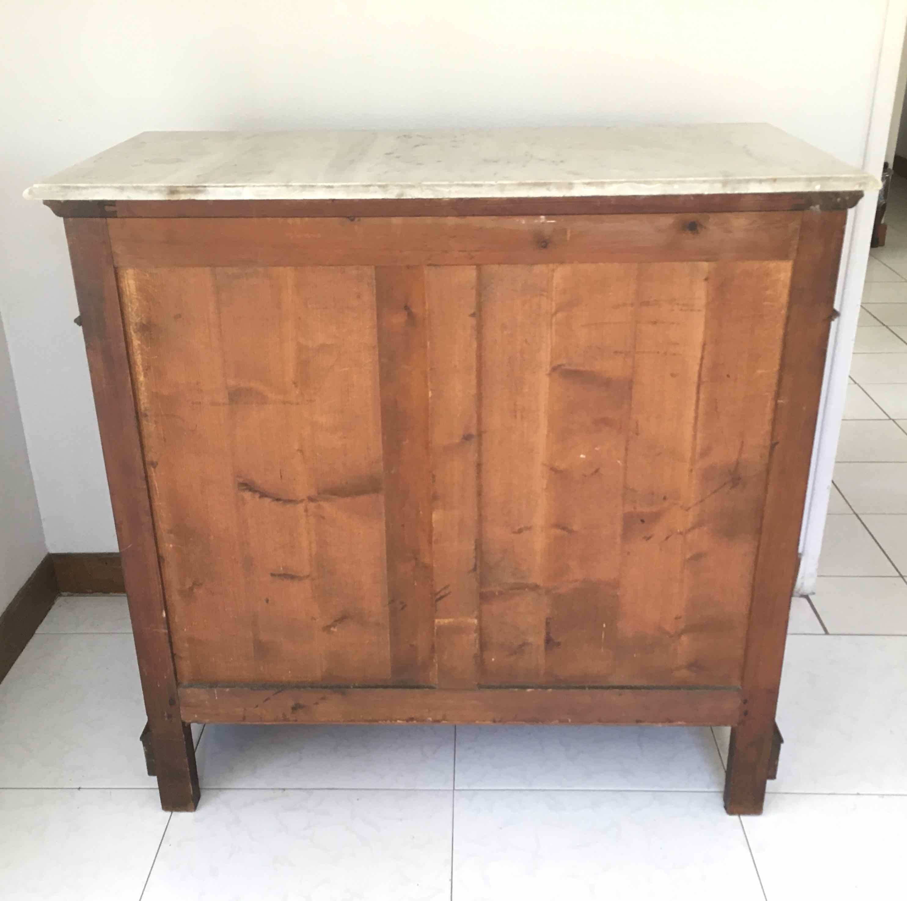 Marble and pitchpin chest of drawers
