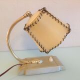 Brass bedside lamp and beige lampshade art deco style
