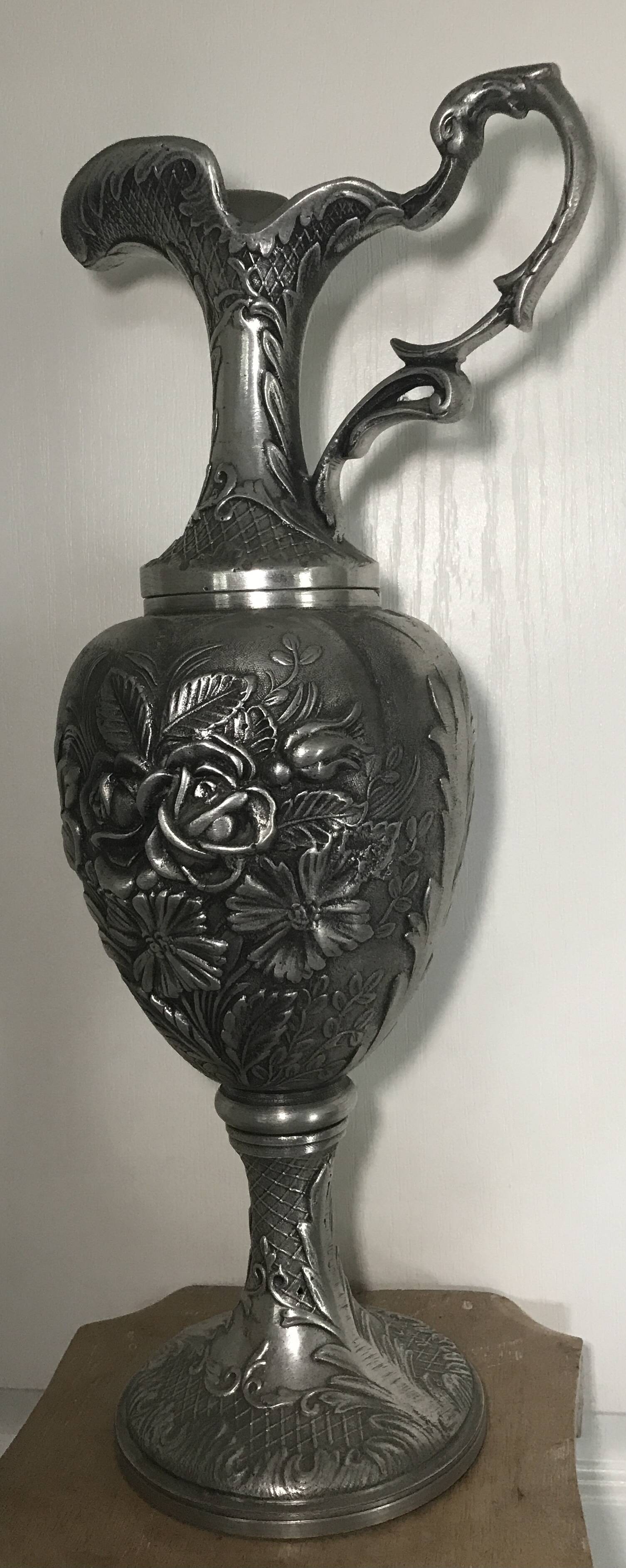 Ewer, Mauro Manetti art foundry, floral embossed decoration and bird's head handle