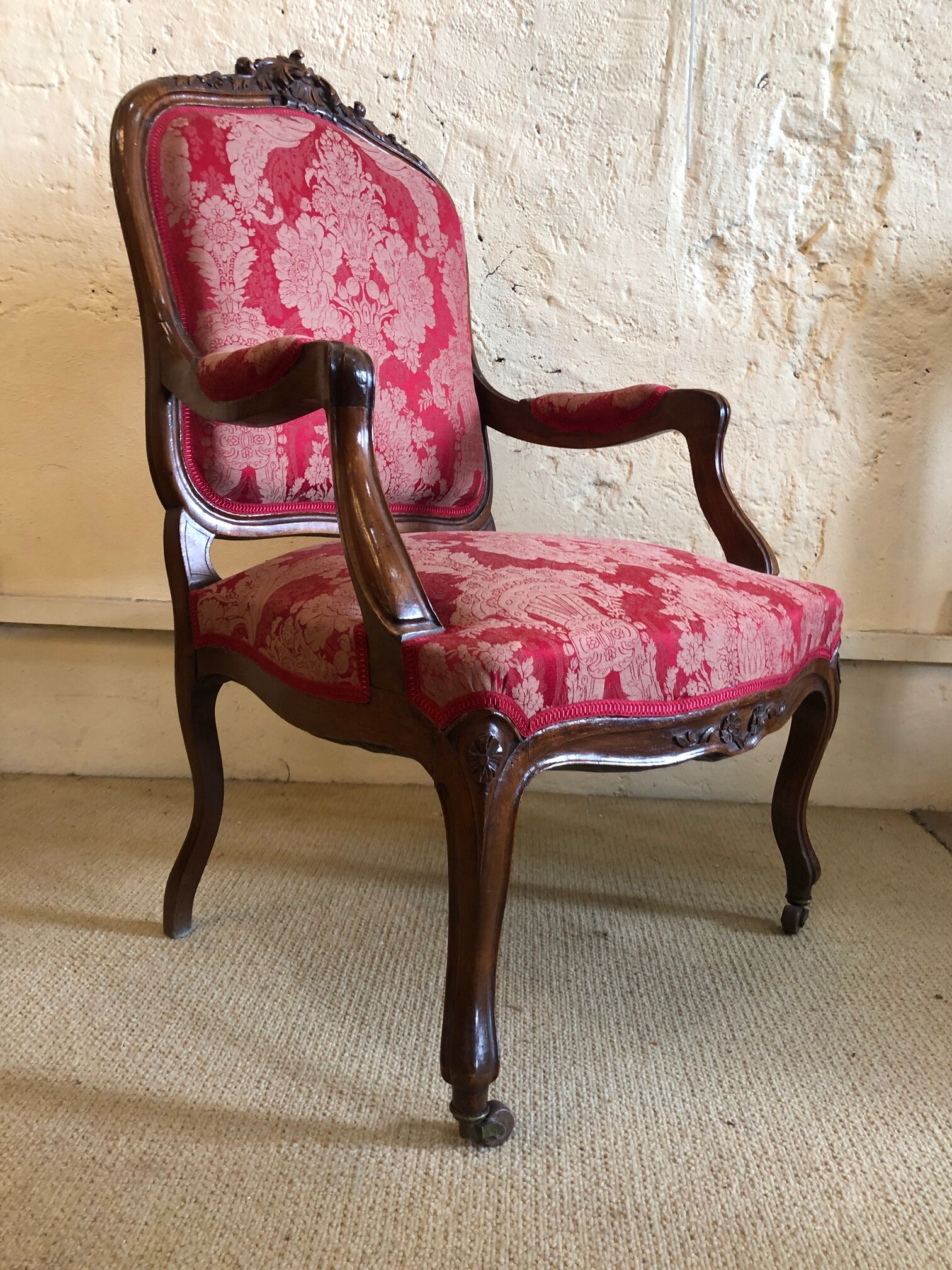 False pair of Louis XV style armchairs, nineteenth century