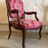 False pair of Louis XV style armchairs, nineteenth century