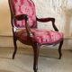 False pair of Louis XV style armchairs, nineteenth century