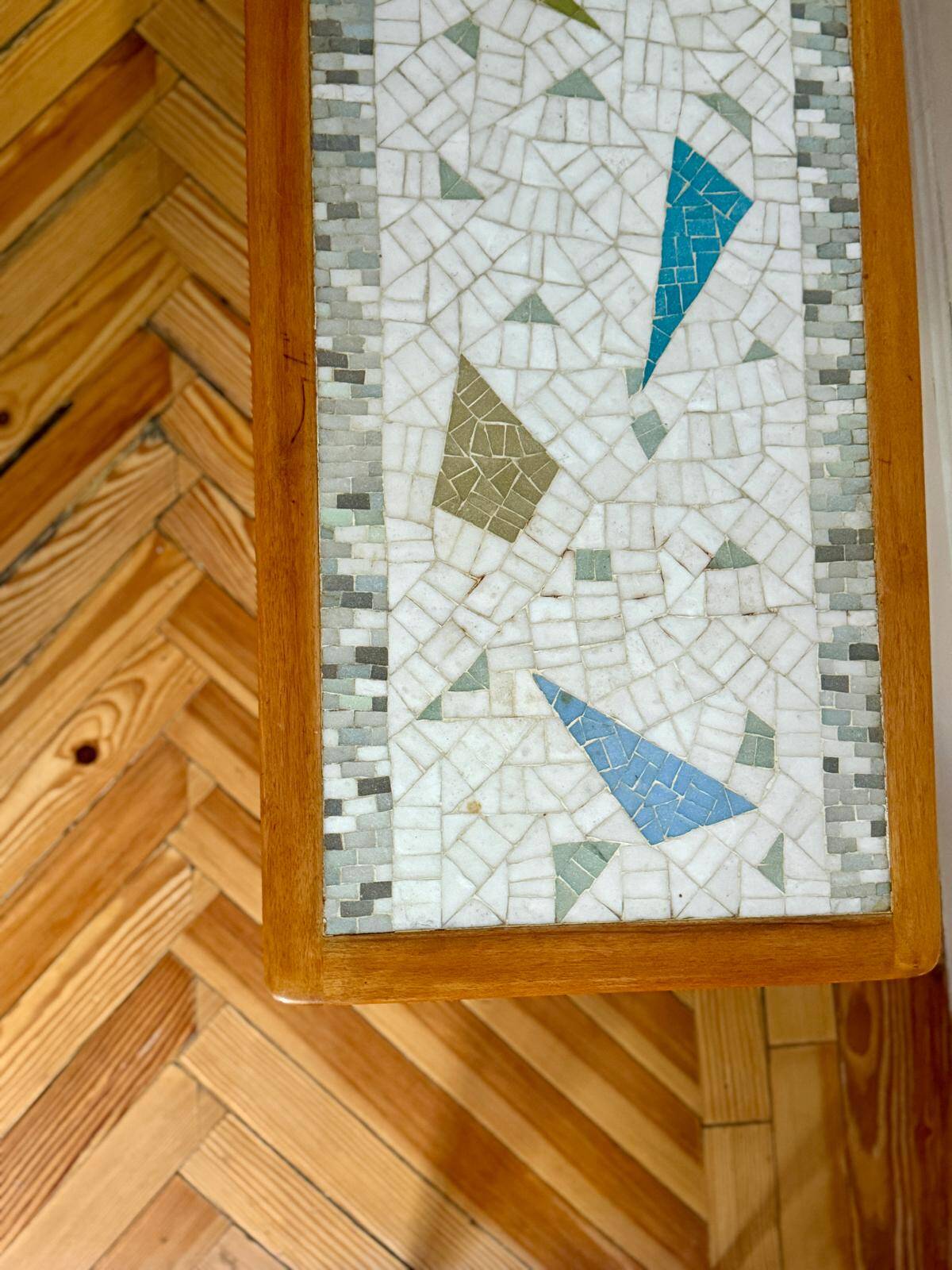 Mosaic coffee table, teak and straw, created by designer Paul Jensen.