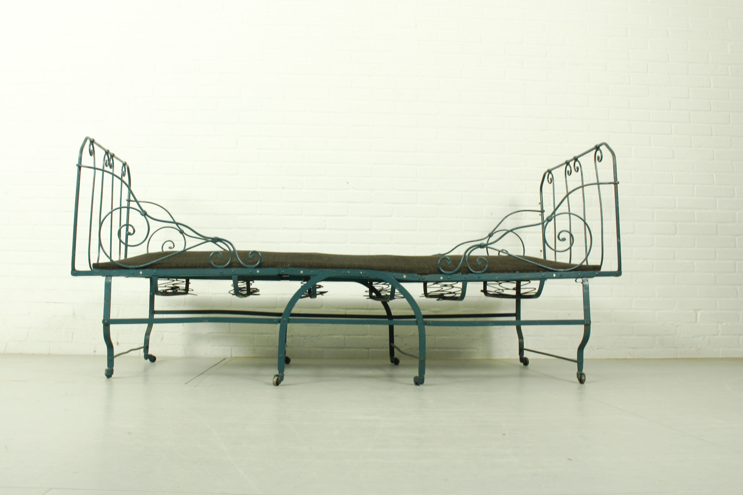 Foldable metal daybed with new webbing and upholstery