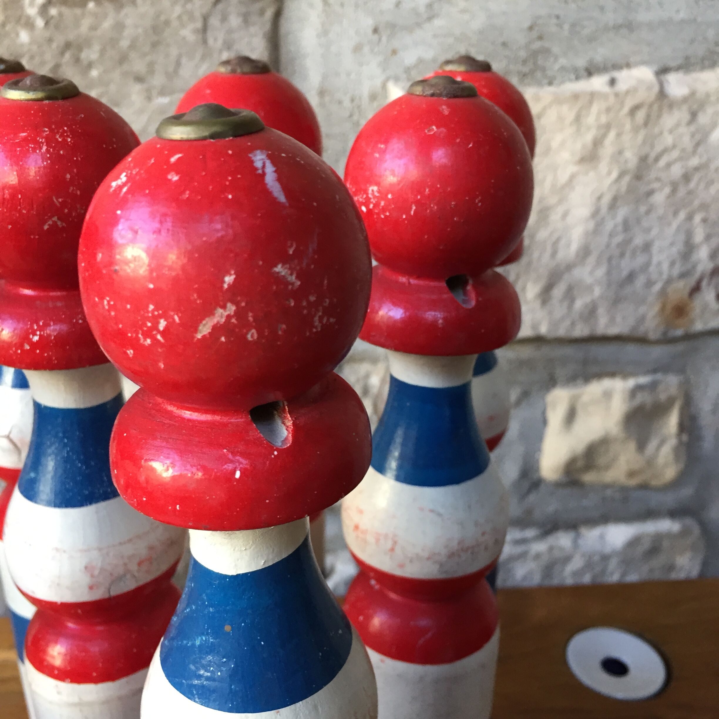Old vintage wooden bowling game triclore plus two balls