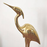 Couple large herons in polished golden brass