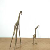 Giraffe and brass bird