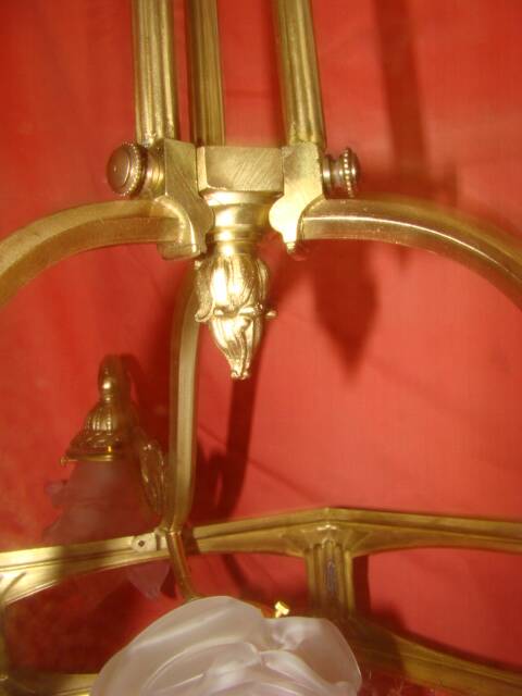 Art Deco period chandelier (1925) with four light arms.