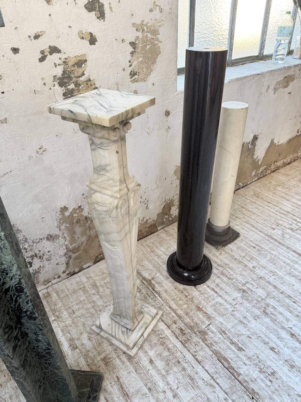 Set of 4 marble columns or pedestals.