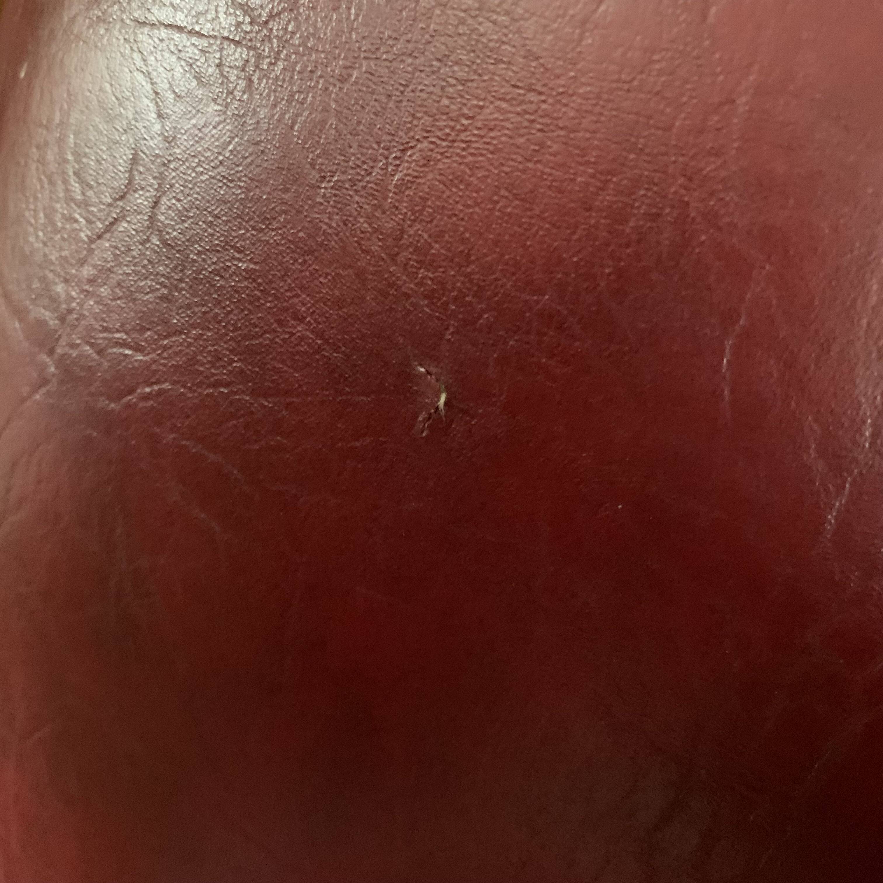 Pair of vintage burgundy red armchairs