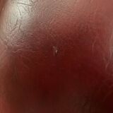 Pair of vintage burgundy red armchairs