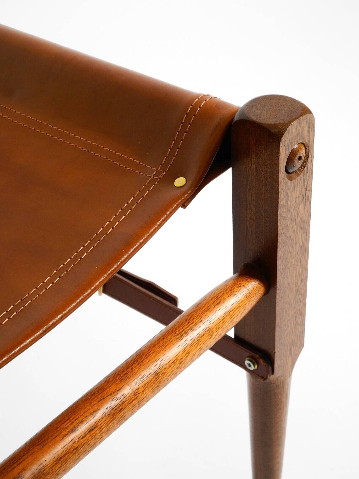 Rare 1990s safari stool with a teak frame and a seat made of brown saddle l