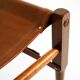 Rare 1990s safari stool with a teak frame and a seat made of brown saddle l