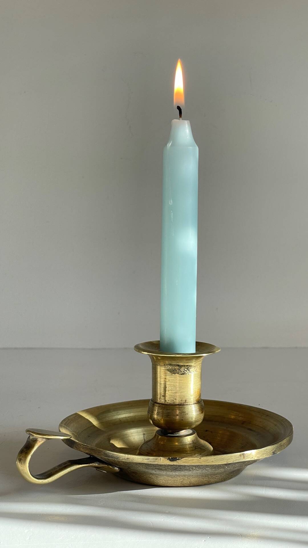Antique solid bronze hand candlestick