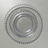 Head to head of crystal plates, Andlau model, signed Lalique