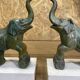 Pair of art deco bookends with elephant decoration in regulated and travertine, vintage