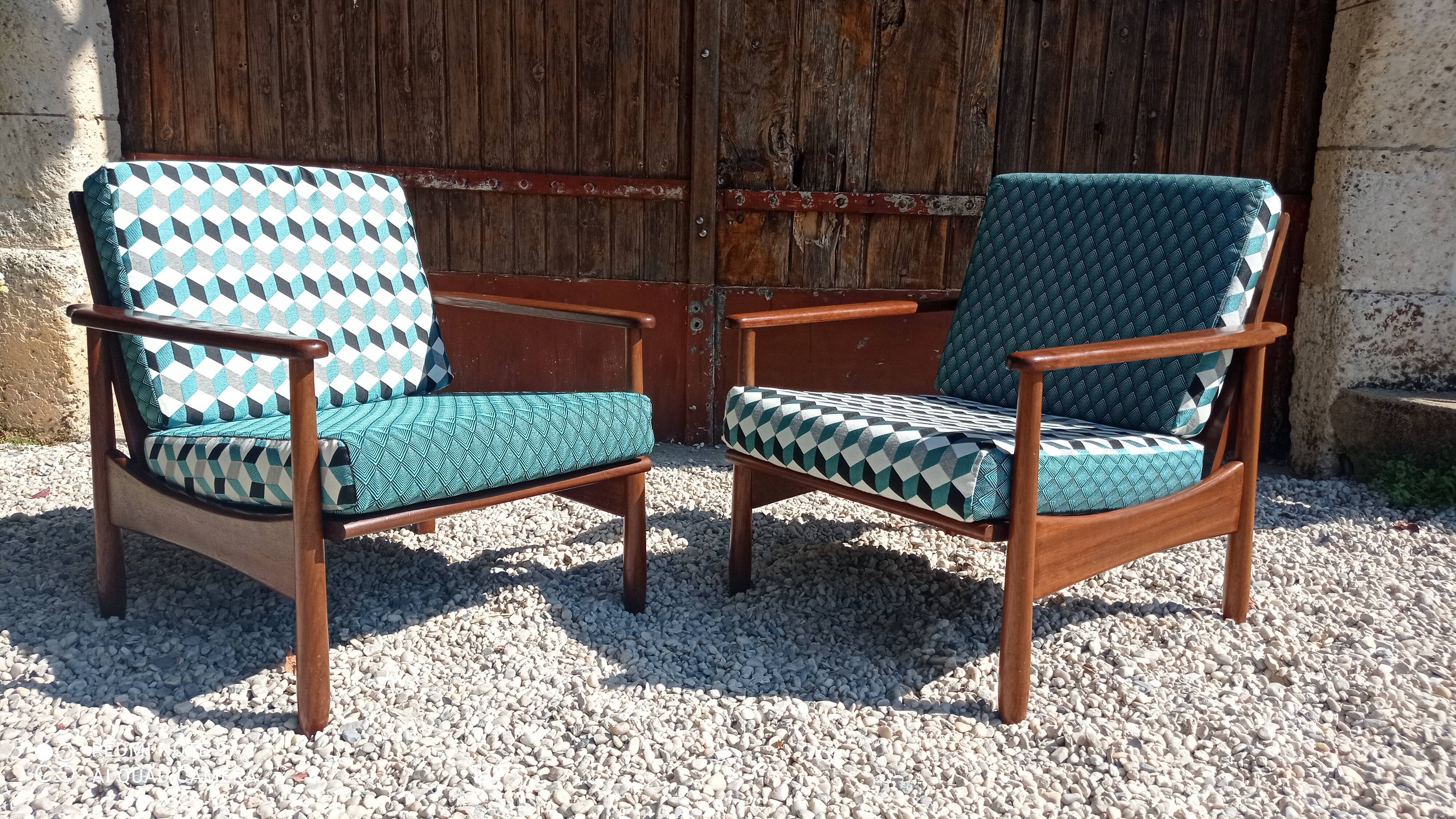 Teak armchairs