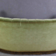 Danish curved green button sofa from the 1940s