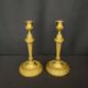 Pair of gilded bronze candlesticks in the Louis XVI style