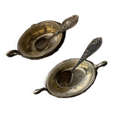 Salt and pepper shakers with silver spoons