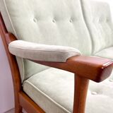 Two-seater sofa from the sixties with green upholstery