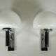 Pair of chrome and glass wall lights from the 1970s.