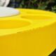 Serving trolley for drinks in yellow plastic, space age 1970.