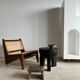 Black mango wood tripod side table with a semi-spherical top, height: 45 cm, diameter: 44 cm.