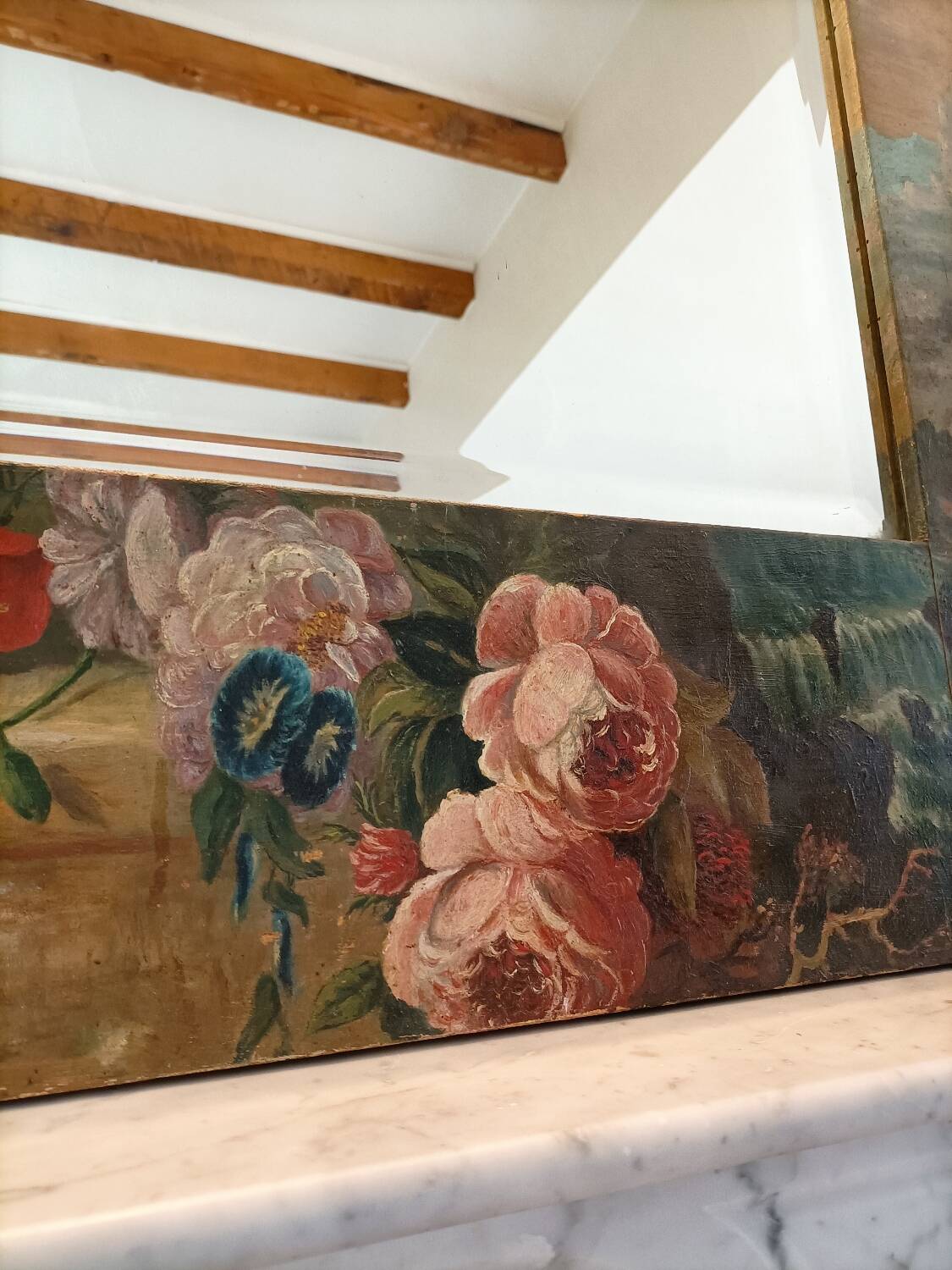 Very large mirror painted in Victorian style.