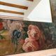 Very large mirror painted in Victorian style.