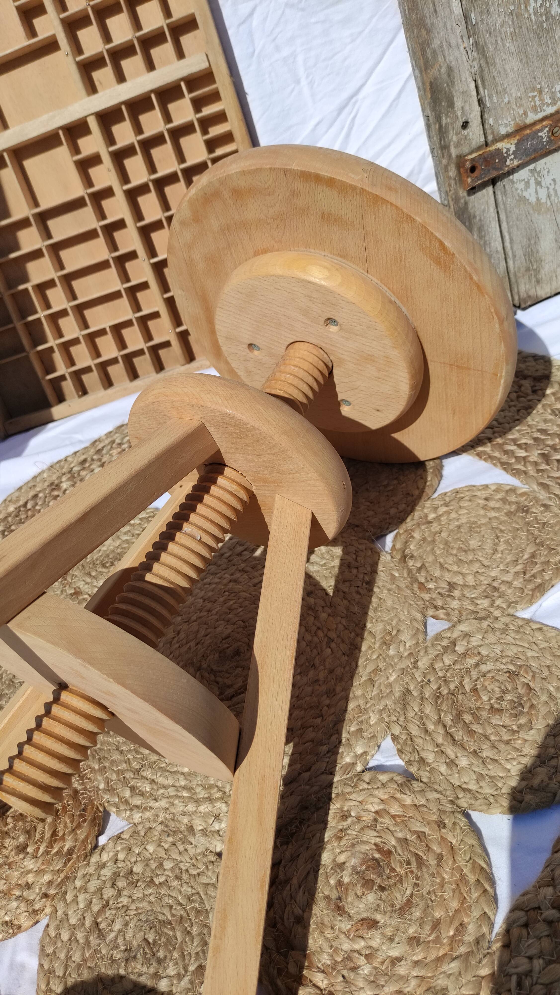 Vintage wooden stool with screws