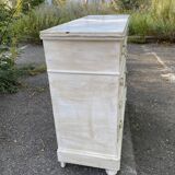 Old chest of drawers in bleached wood with white marble top