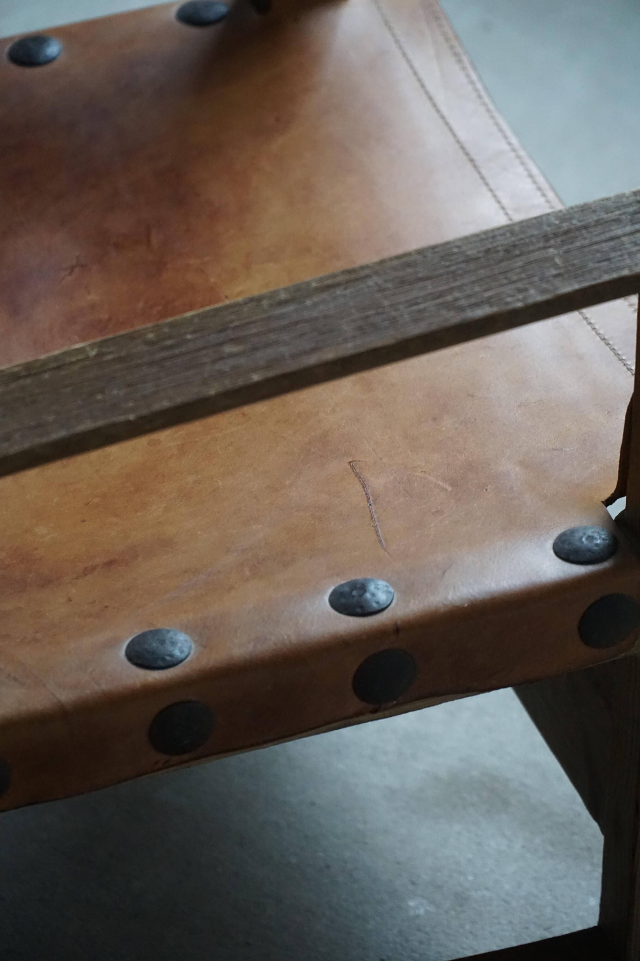 Pair of Spanish brutalist armchairs from the 1960s, wood and leather.