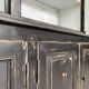 Display cabinet in patinated wood