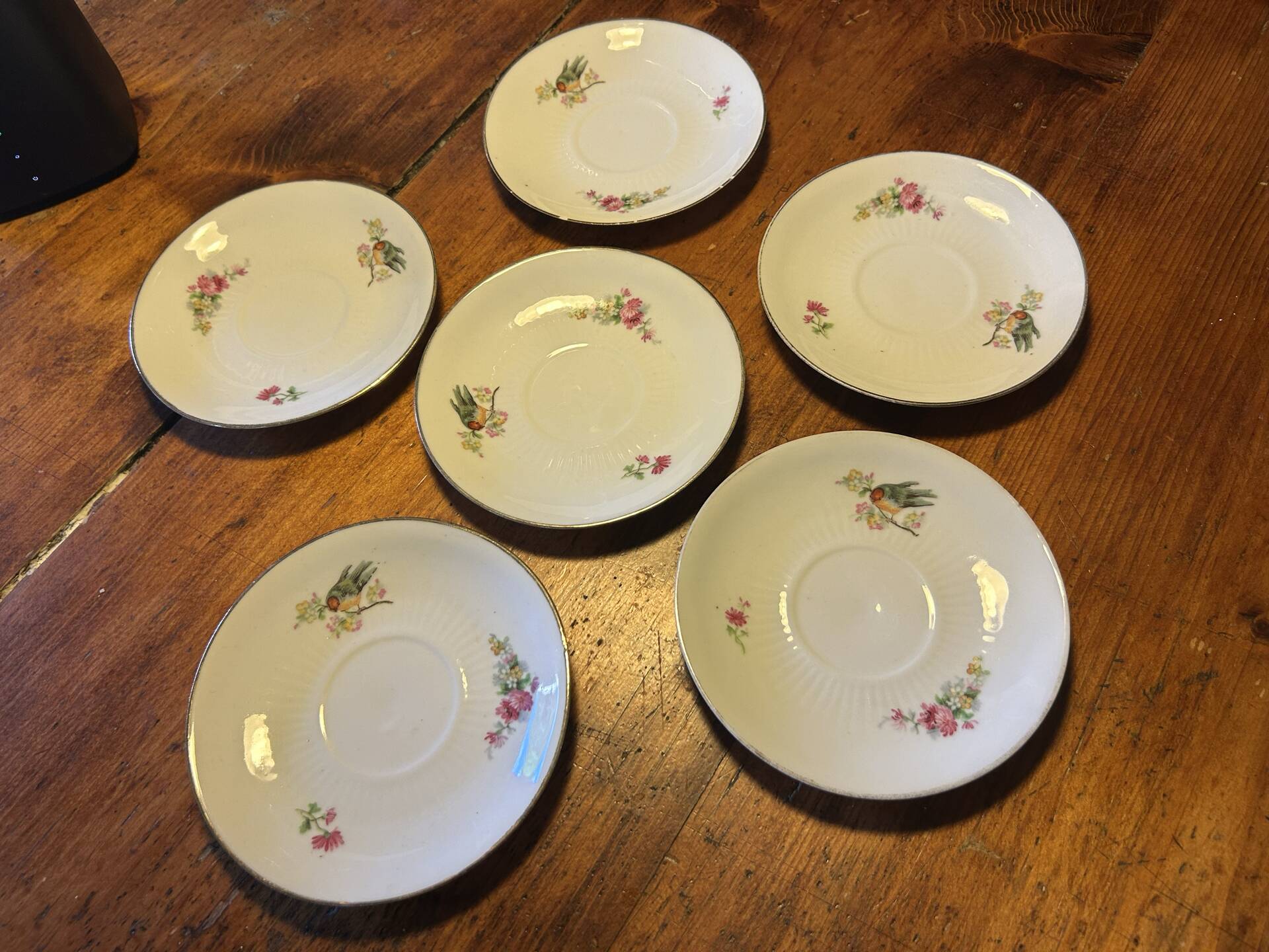Set of 6 antique porcelain saucers