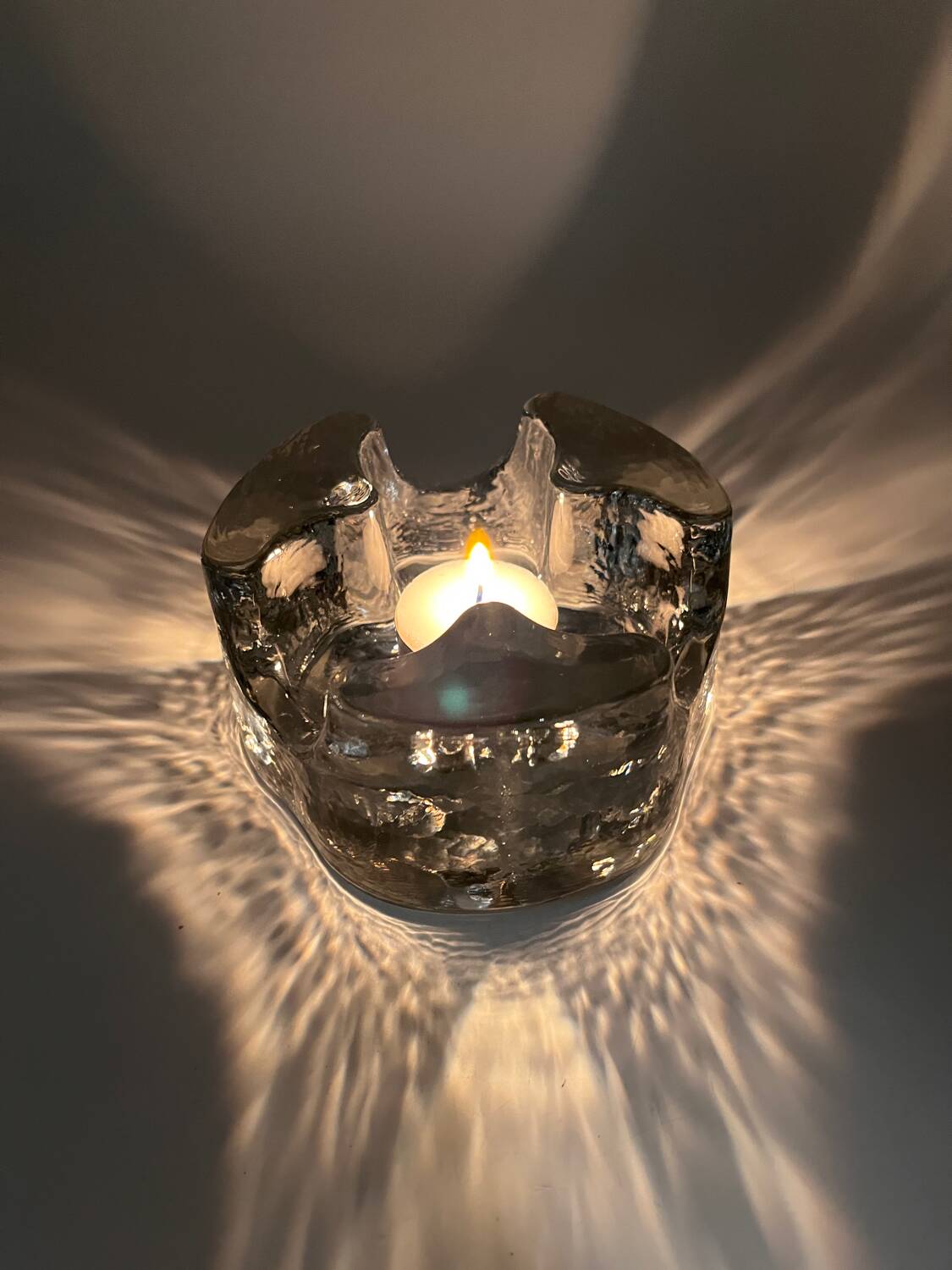 Solid glass candle holder