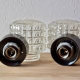 Old pair of molded glass and Bakelite wall or ceiling lights